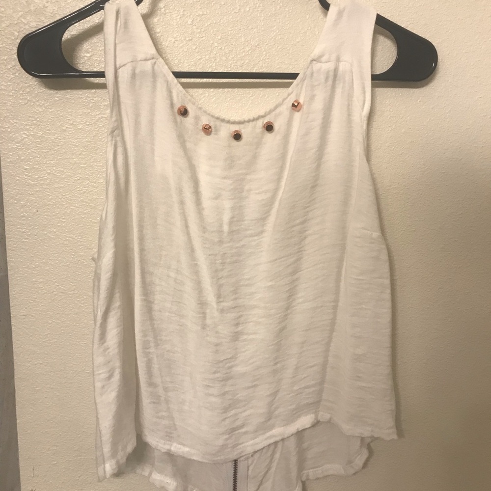 BCBG White tank with cut outs